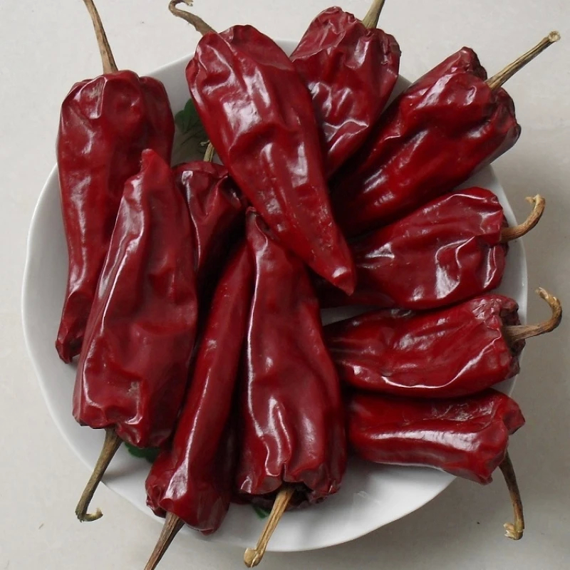 100 Kcal/100g Kuru ve Soğuk Yerde Depolama Yolu için Kurutulmuş Uzun Kırmızı Çili